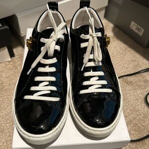 Black and white Versace sneakers with gold hardware. 100 % authentic!!!